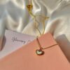 Jasmine Gold; two sided necklace
